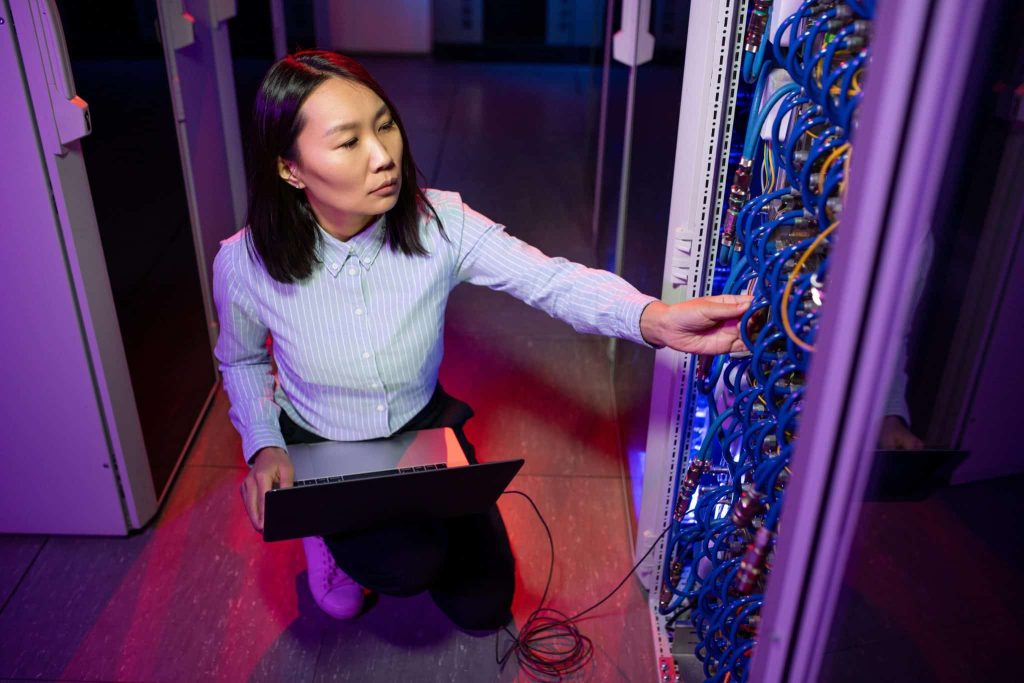 asian-woman-working-in-server-room