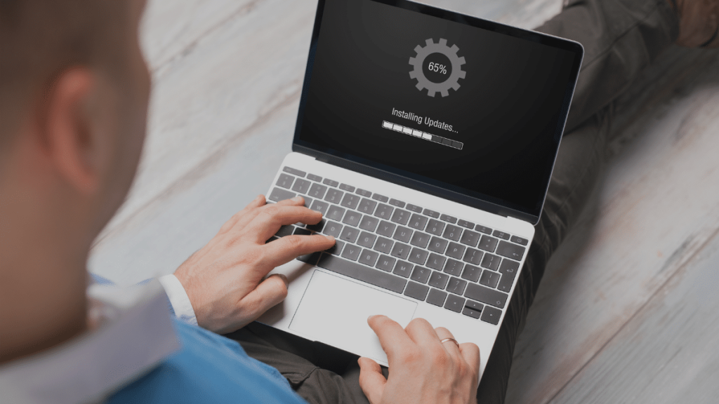 man downloading software update on computer