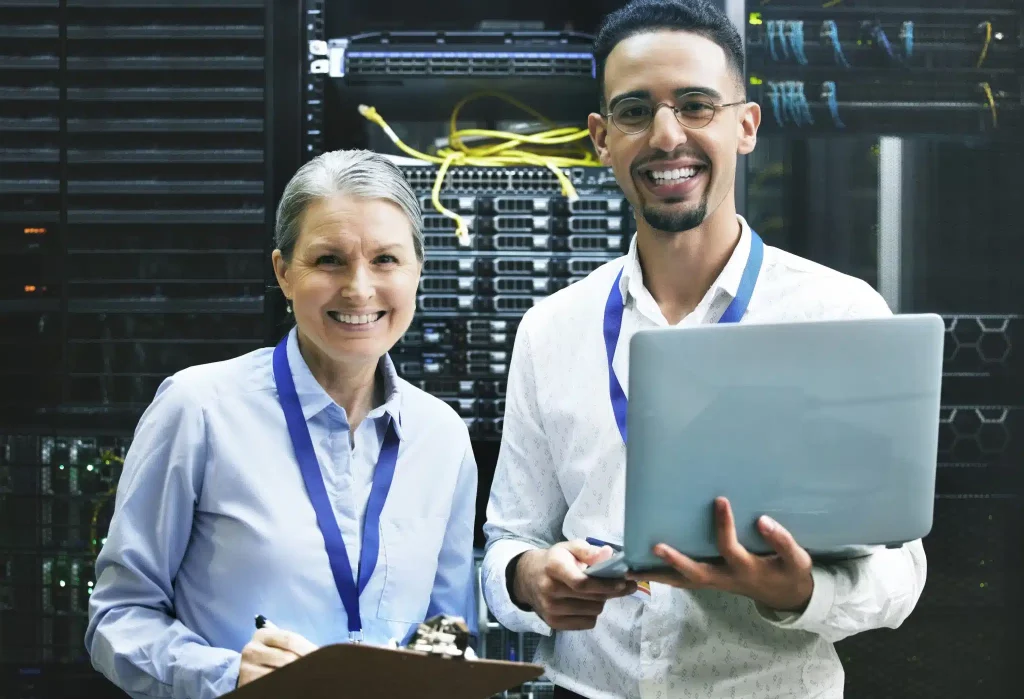 teamwork-makes-technology-work-shot-of-two-techni-2023-11-27-05-33-29-utc-scaled