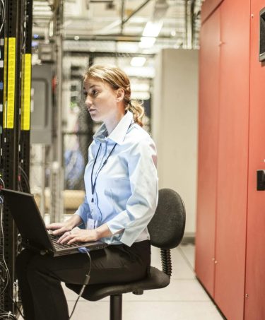 caucasian-woman-technician-working-on-computer-servers-in-a-server-farm--qqwvq94ikw3urcrtmvw2jekepykicuu0f4fjvry6pe