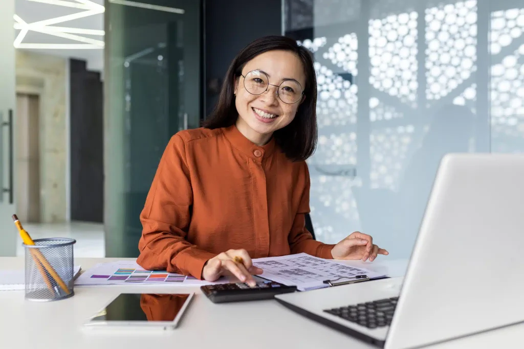 portrait-of-young-asian-successful-financier-worki-2023-11-27-05-15-50-utc-scaled