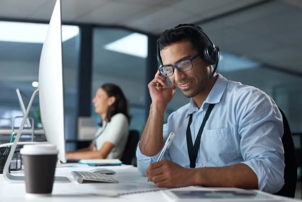 shot-of-a-young-man-using-a-headset-and-computer-i-2023-11-27-05-29-37-utc-scaled shot-of-a-young-man-using-a-headset-and-computer-i-2023-11-27-05-29-37-utc-scaled