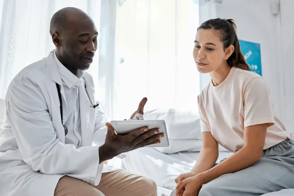 tablet-woman-consulting-with-doctor-or-medical-healthcare-worker-on-research-surgery-or-medicine-