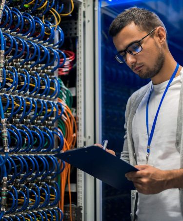 young-man-working-with-servers-qqwvrqpbeg5754lzy11szj1okx8fjlqpmhm88jqquq